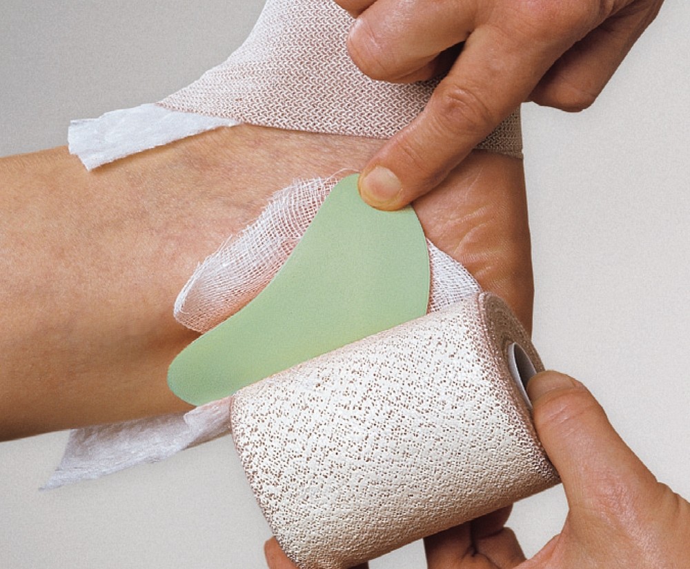 Komprex, skum pelotte til kompressionsbehandling, 12 cm x 6,5 cm x 1,5 cm